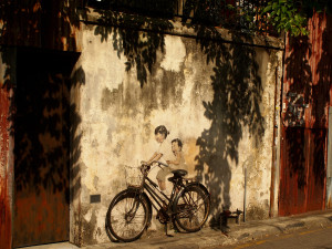 siblings on a bike